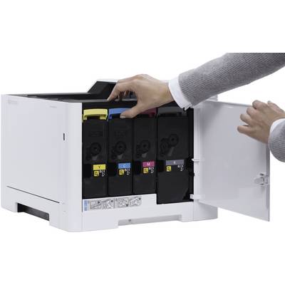 A person opens the flap of a printer to change the ink cartridges. The cartridges are in the colours Yellow, Cyan, Magenta, and Black.