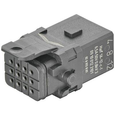 Black electrical connector housing with multiple square sockets and white labelling on the side.