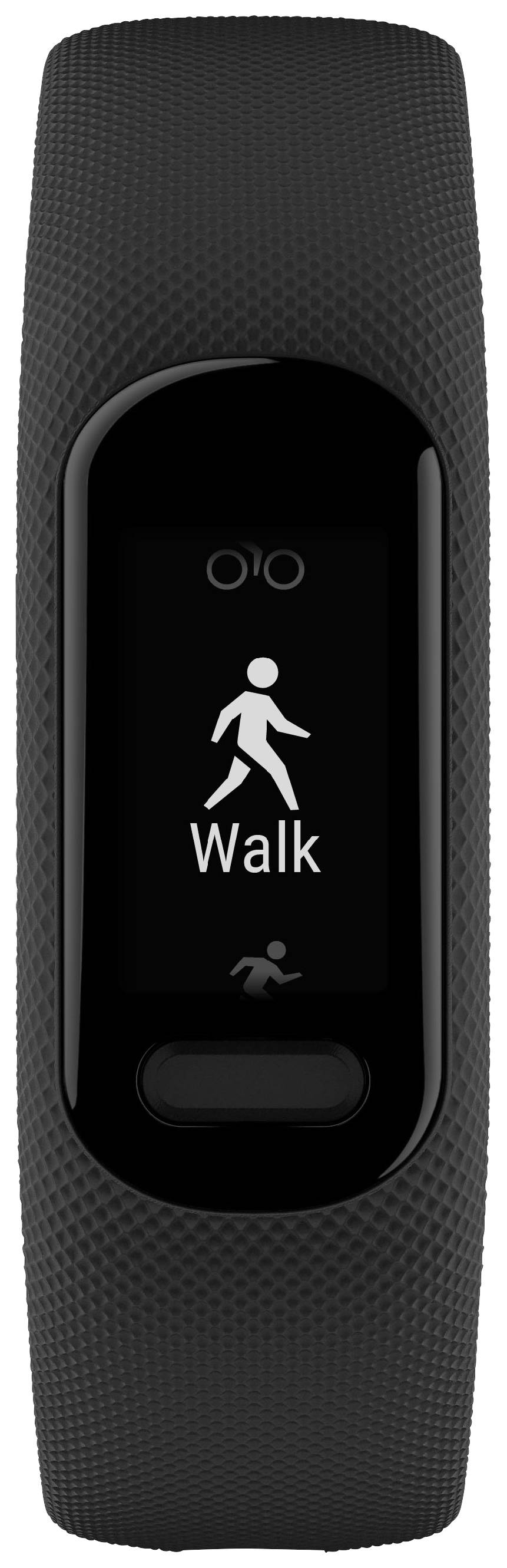 Black fitness band shows a pictogram of a walking person with the display 'Walk' on the screen.