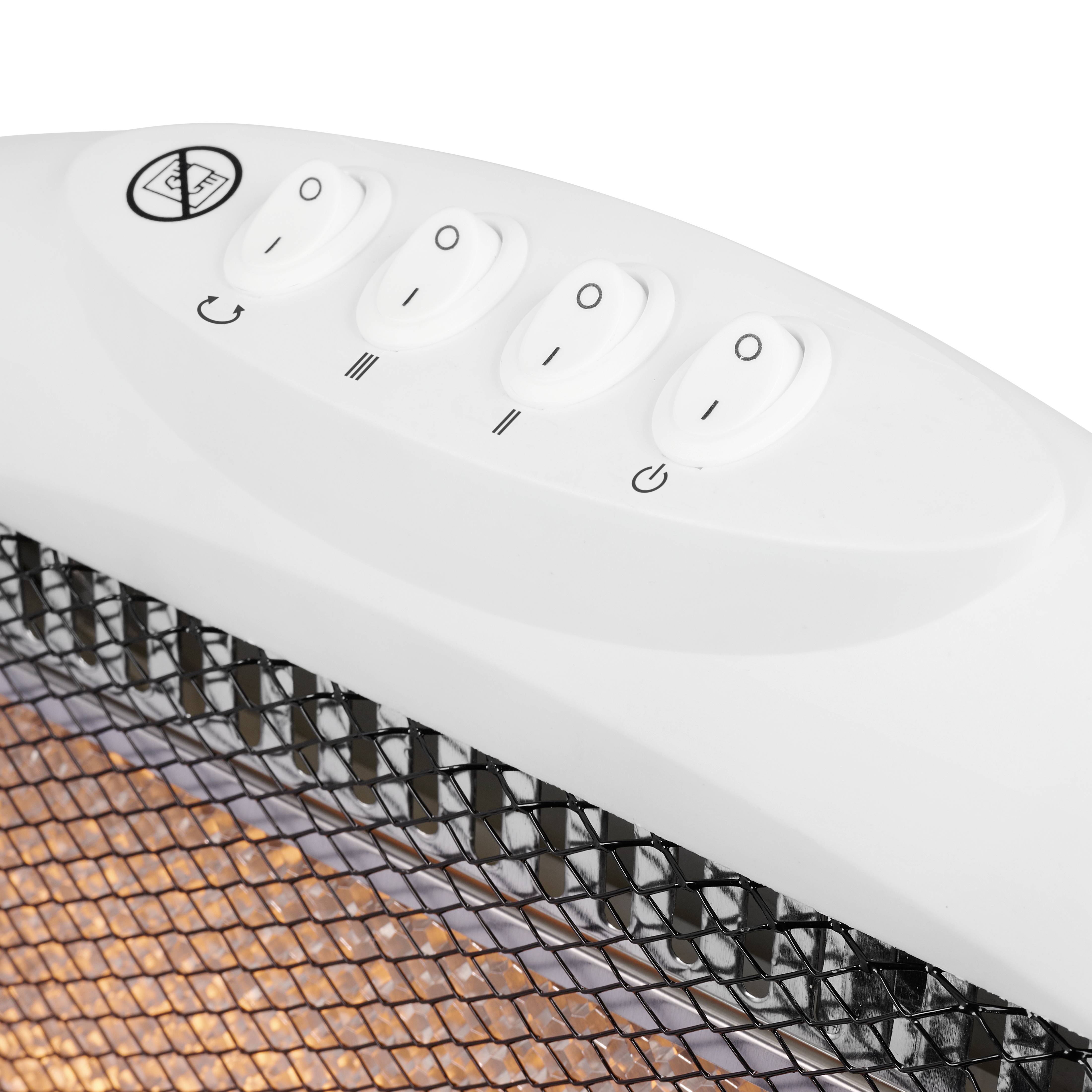 'Close-up of a heating device with four toggle switches and heat protection grille, suitable for indoor use.'