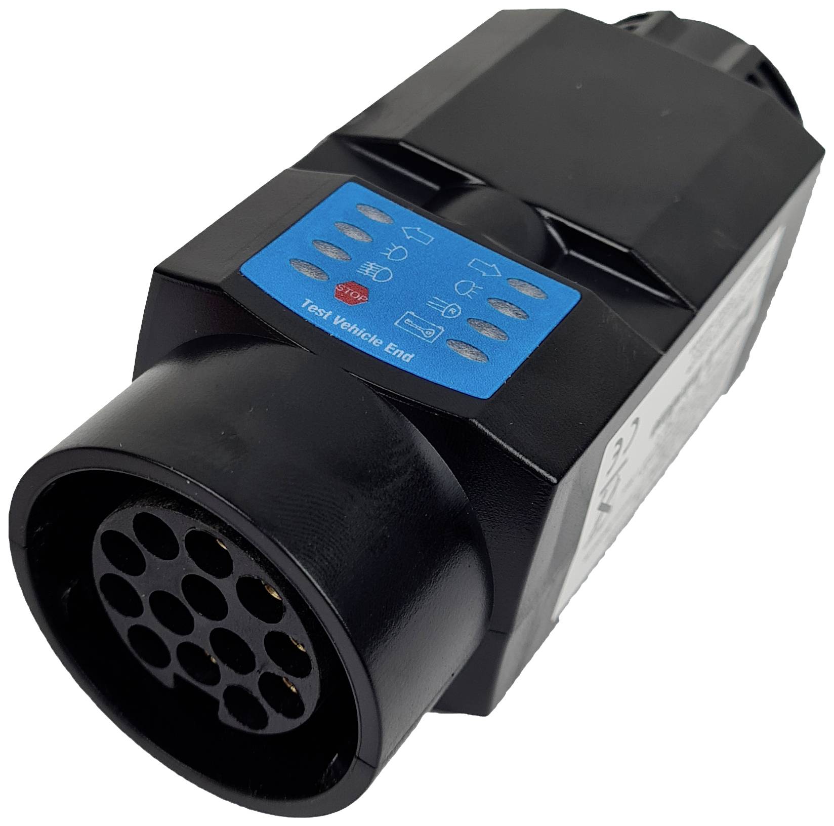 A black adapter with multiple round connectors and blue labelling. Marked with 'Test Vehicle End'.