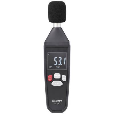 A sound level metre shows a reading of 53.1 decibels on a digital display. The device has control buttons underneath.