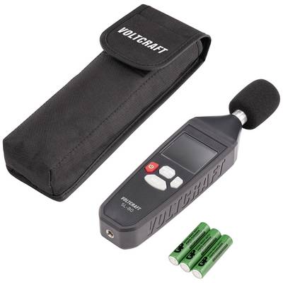 Sound level meter with display, alongside a black case and three batteries. Suitable for measuring noise levels.