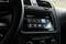 Car journey, glancing at the car radio display. Shows date 'Monday, 25 October 2020', time 12:35, and various automotive media icons.