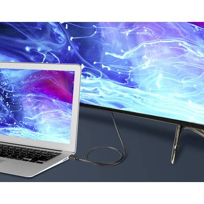 A laptop connected to a large monitor via a cable. Both screens display an abstract blue pattern.