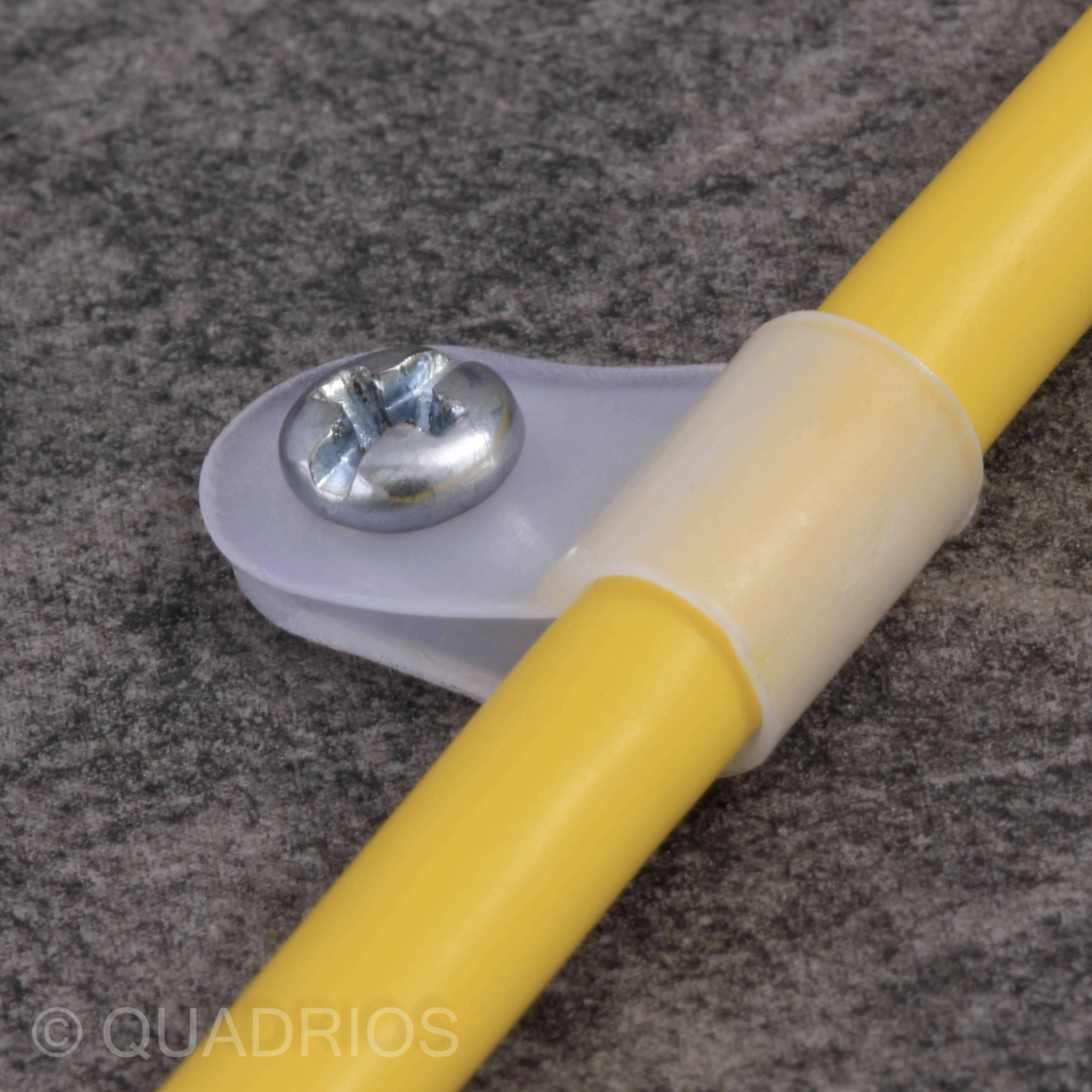 Yellow cable with plastic clip and metal screw fastened to grey surface.
