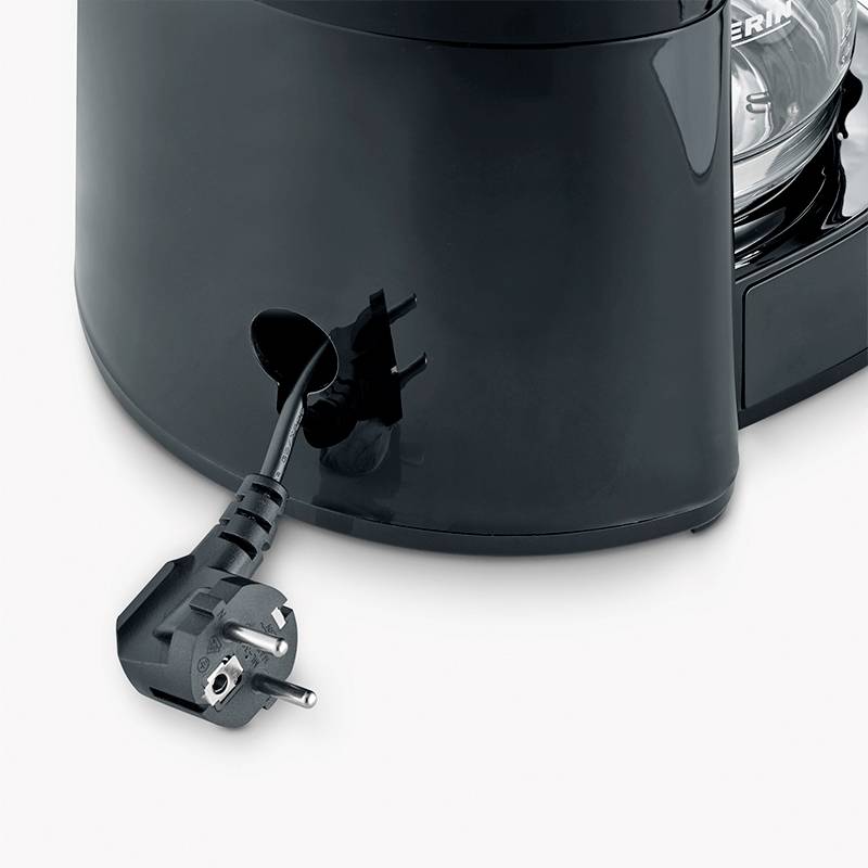 Electric kitchen appliance with a removable cable stored in the integrated cable winder. Device design in black.