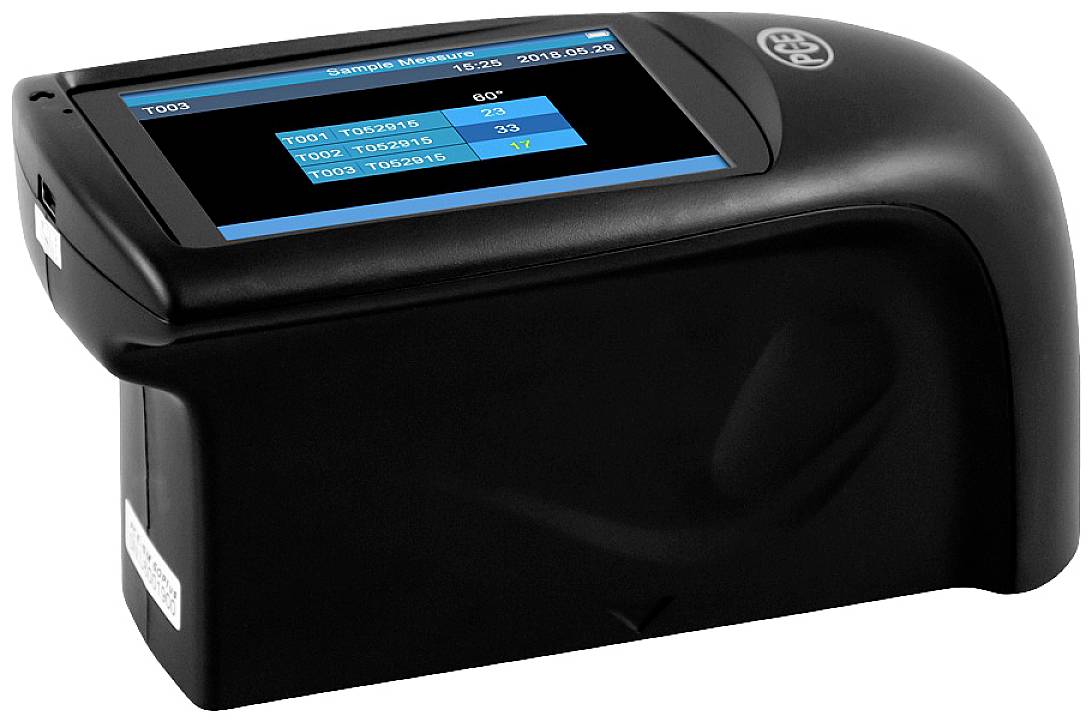 A portable device with a digital display that shows measurements or data.