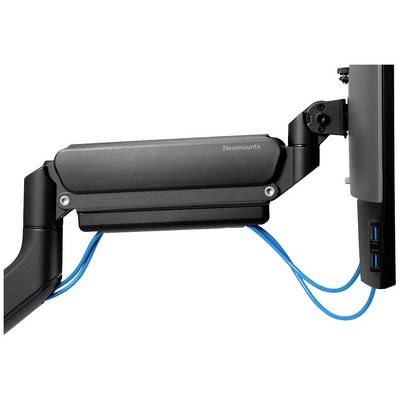 Monitor arm with integrated cable management, holding a screen against the wall. Blue cables are neatly routed.