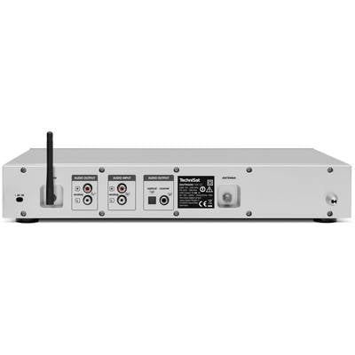 Rear view of a silver audio receiver with various audio inputs and outputs and an attached antenna.