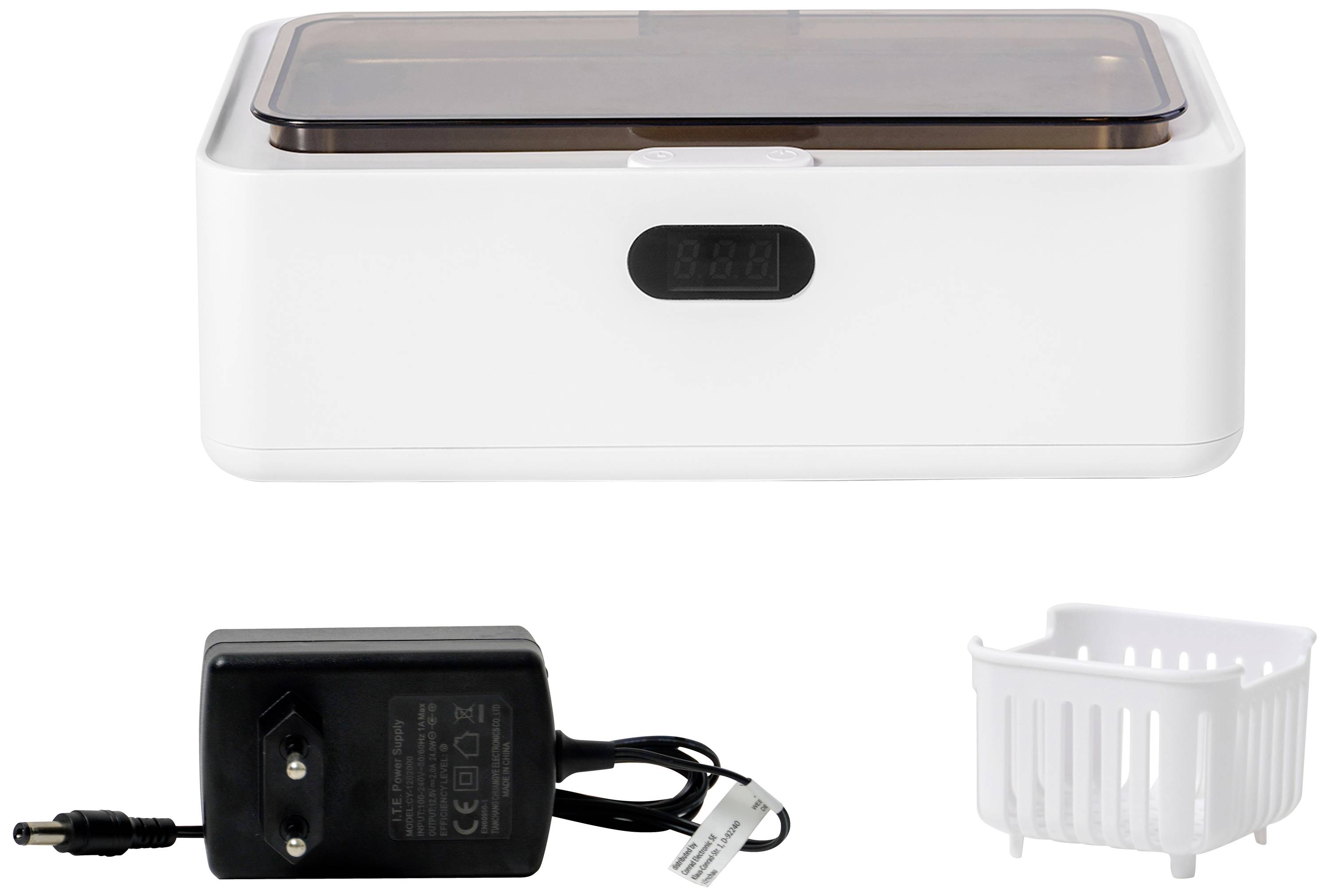 White ultrasonic cleaner with removable brown hood, digital display at the front, black power supply, and small white basket.