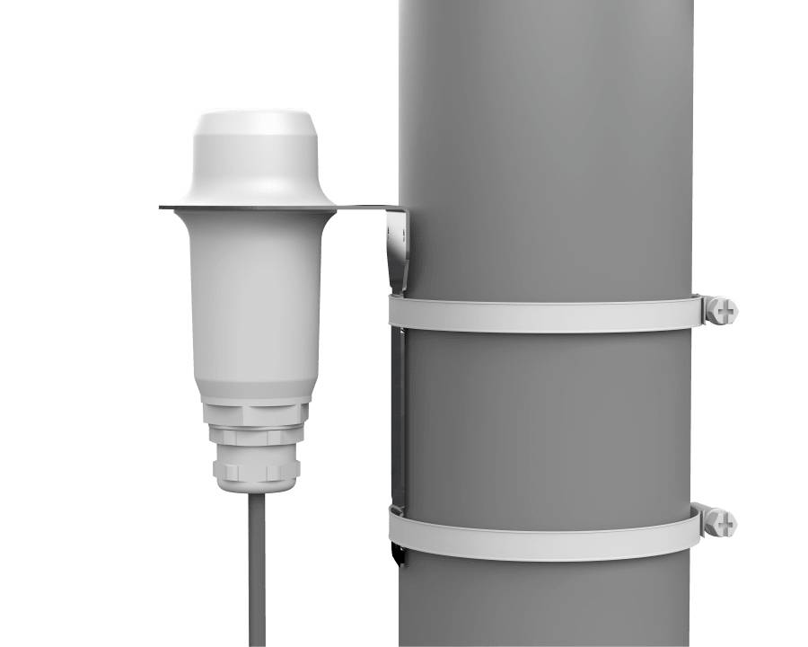 A sensor is attached to a metal pipe. The mounting bracket secures it firmly to the pipe. Cables run from the sensor, most likely for data transmission.