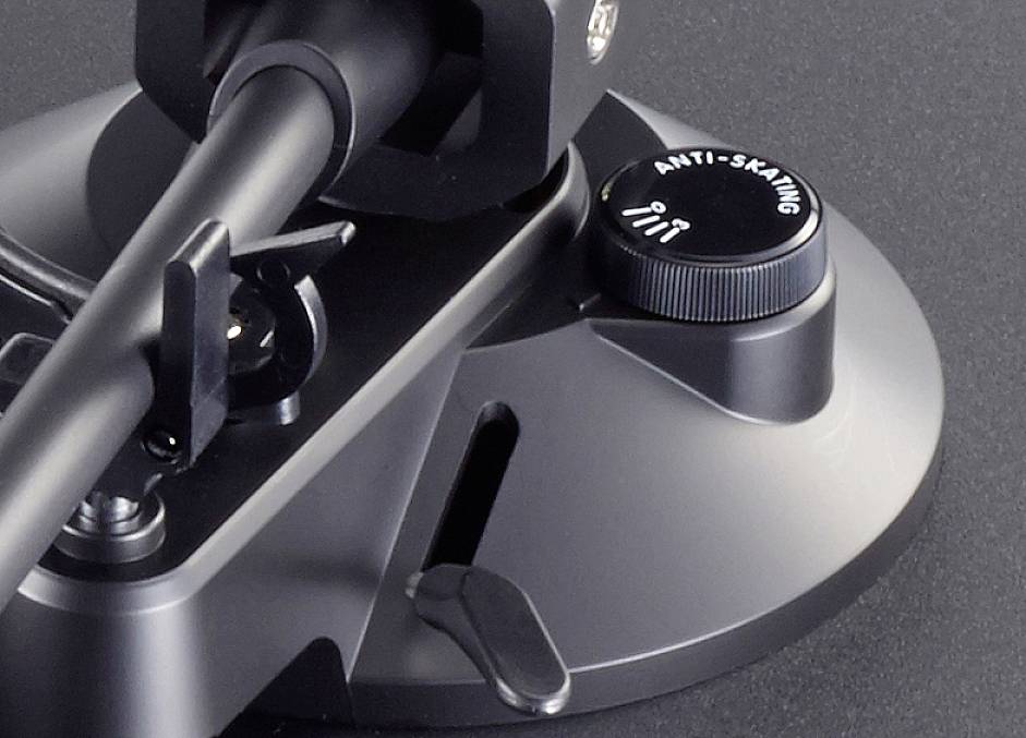 Close-up of a turntable arm with an anti-skating control.