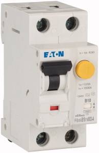 Electrical safety switch with a yellow test button, black lever, and brand name printed. Used for interrupting electrical circuits.