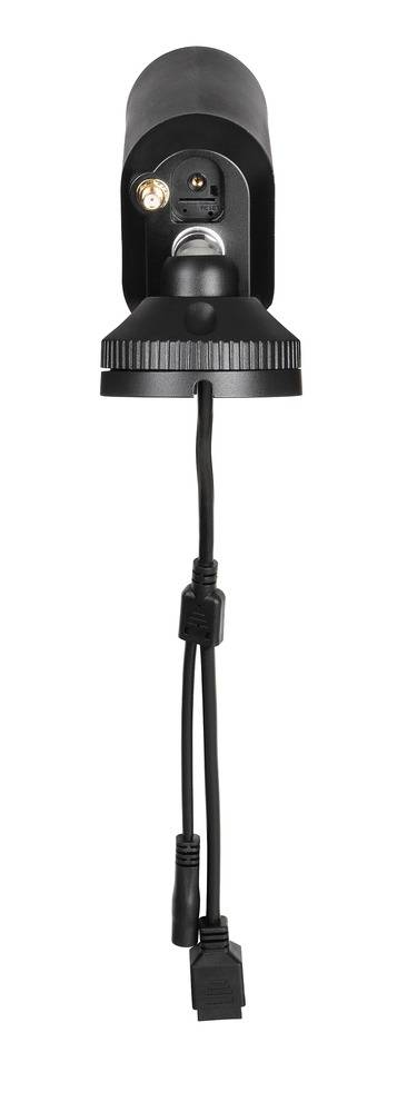 'A black surveillance camera with two cables hangs down from the underside.'