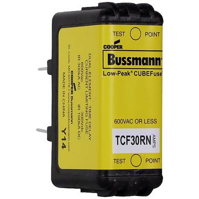 A yellow Bussmann fuse module with the inscription 'Low-Peak CUBEFuse' and specifications for voltage and amperage.