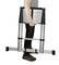 A person is carrying a folding aluminium ladder, holding it sideways against their body. The ladder is compact and easily portable.