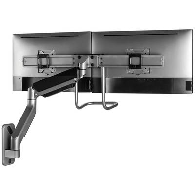 A dual monitor arm is wall-mounted. It holds two monitors side by side and allows flexible positioning.