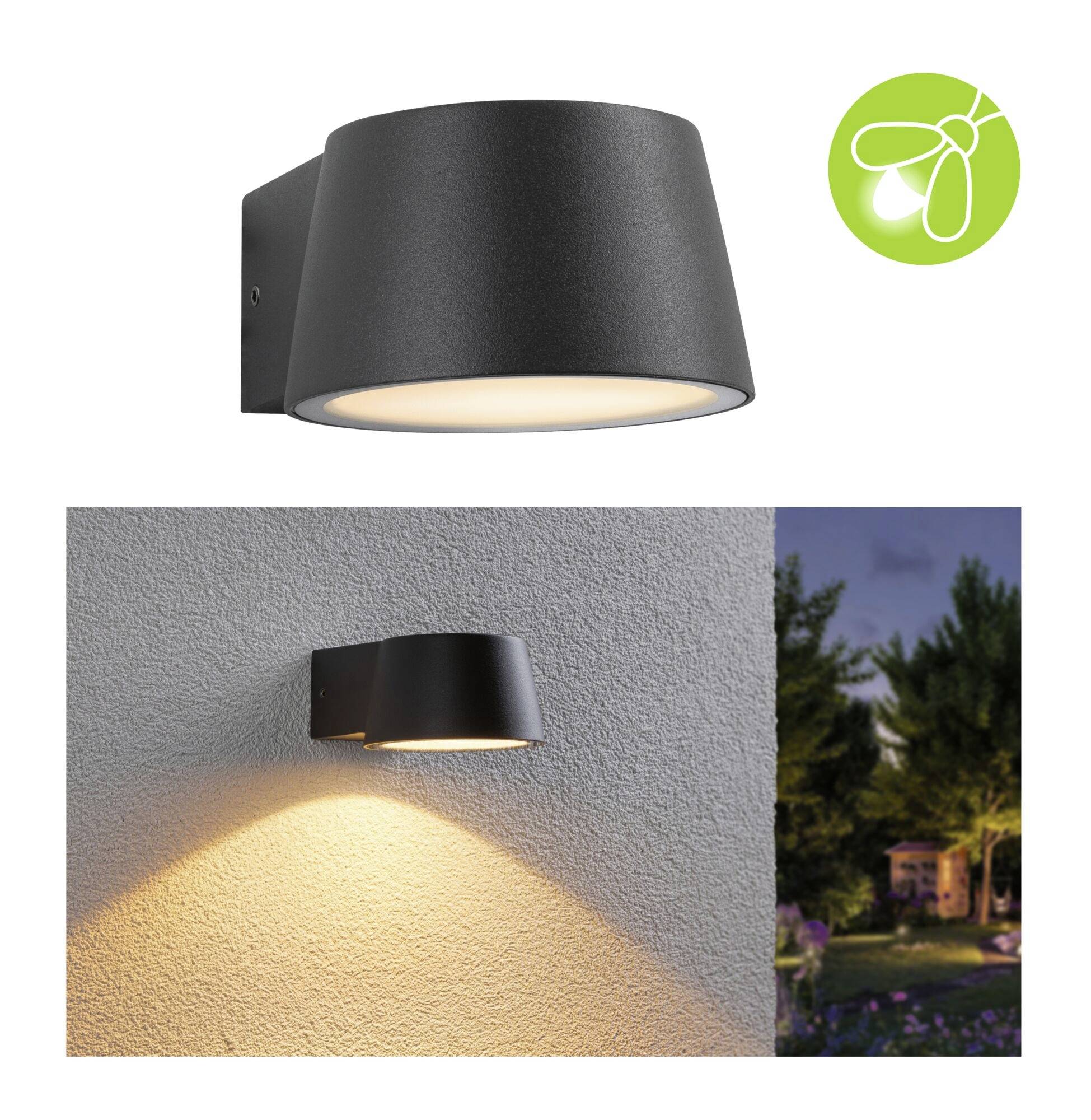 A black, downward-facing exterior wall light illuminates on a wall. A green light bulb symbol is positioned in the top right corner.
