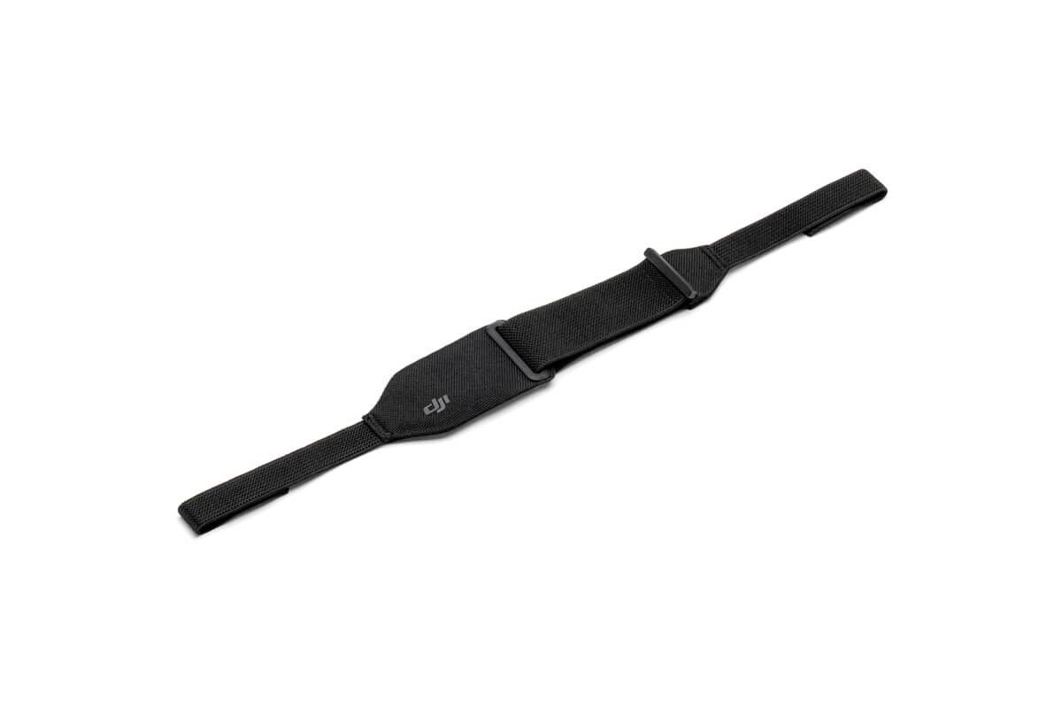 Black, adjustable strap with buckles, suitable for camera accessories.