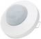 A round, white motion sensor with a curved cover and a mounting bracket on the side.
