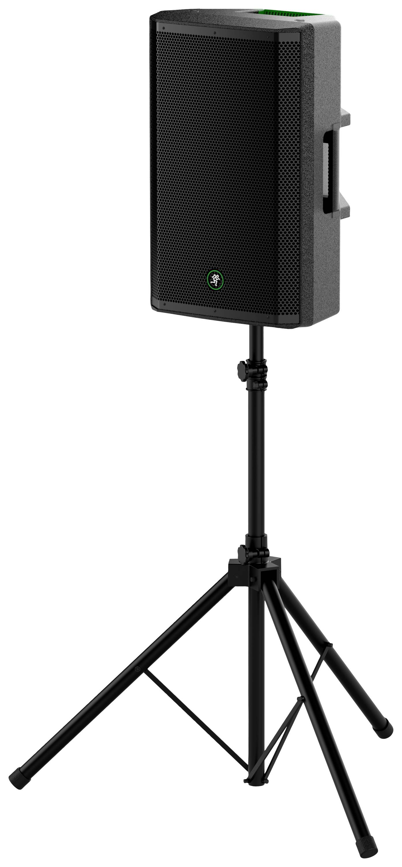 Black speaker on a stand. Contains a rectangular shape with a carrying handle on the side.