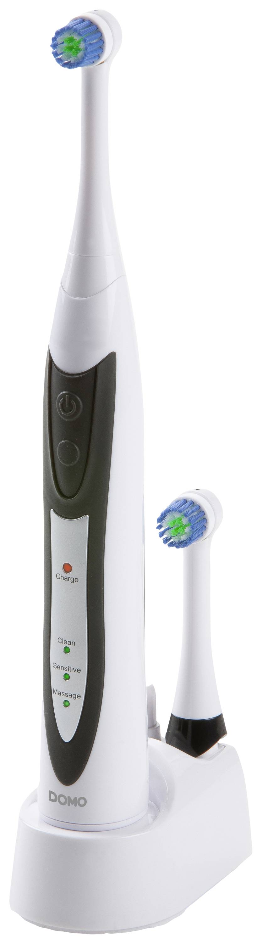 Electric toothbrush in a charging station with a replacement brush head. The toothbrush has a black handle and several control buttons.