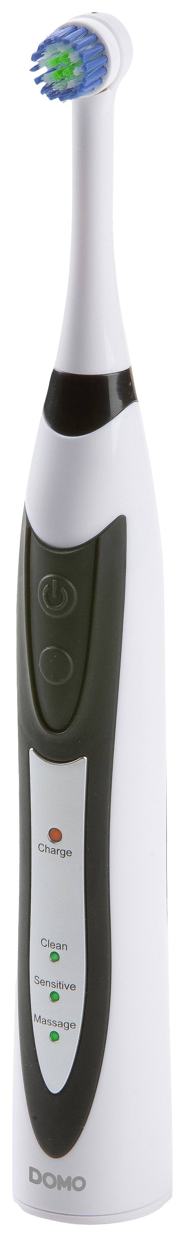 Electric toothbrush with a white handle and blue bristles, black rubber gripping for better hold and green LED indicators on the handle.