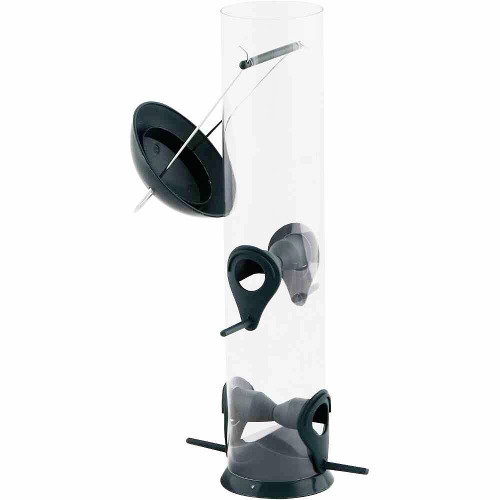 'Transparent bird feeder with suction cups attached to a glass pane, featuring three openings for birds to feed.'