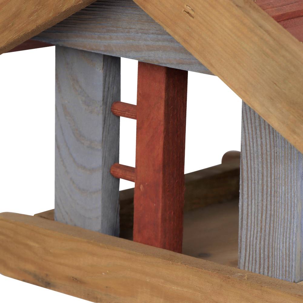 A wooden playhouse with blue and red struts, suitable for creative children's play indoors or outdoors.