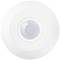 A circular motion sensor with a transparent cover, mounted on a white wall or ceiling.