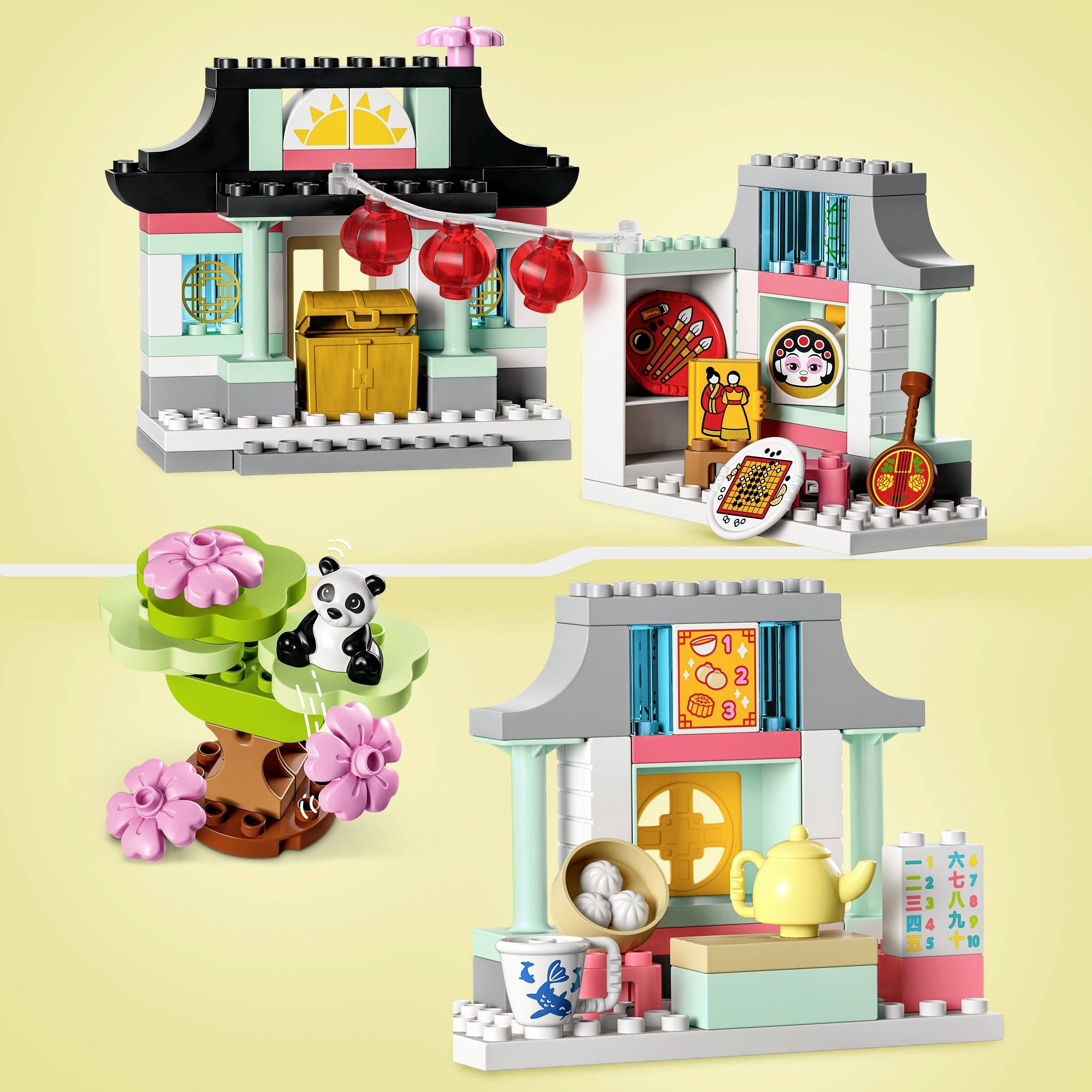 A Lego set depicts an Asian teahouse with a red lantern, panda tree, and teapot. Colourful accents complement the design.