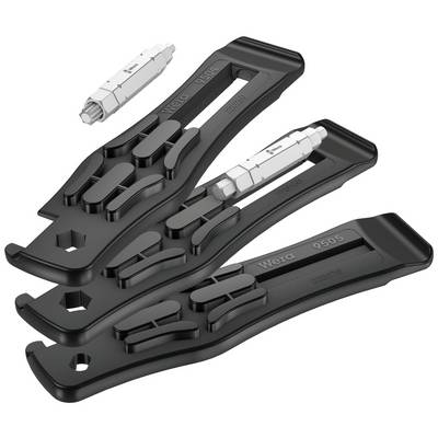 Three black plastic tyre levers with an integrated bit magazine, and a bit lying separately beside them.