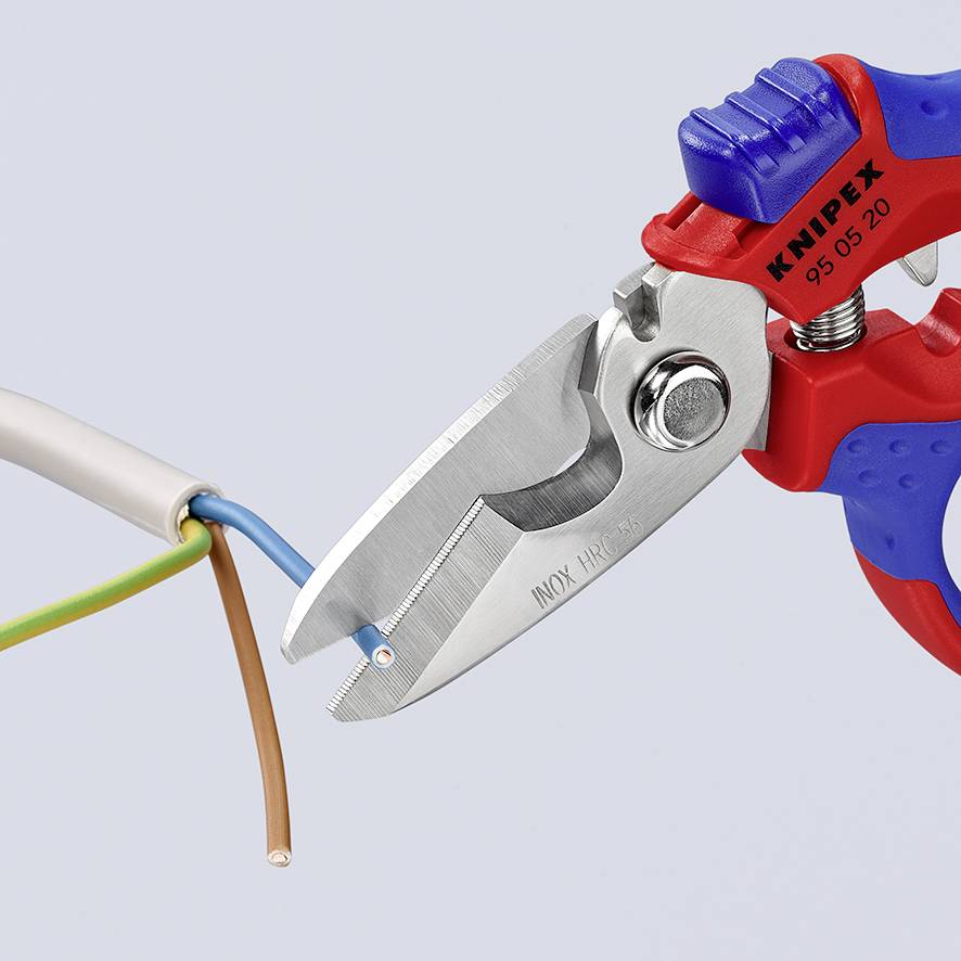 A blue and red pair of pliers cuts through a multi-core cable. The blade is made of stainless steel, with 'KNIPEX 95 05 20' visible on the pliers.