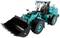Green wheeled loader with large bucket, ready for earthworks or material transportation.