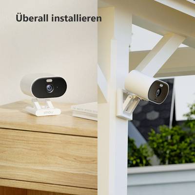The image shows two surveillance cameras: one mounted on a wooden table indoors and one installed on an exterior wall outside. Text: 'Install everywhere'.
