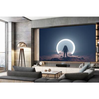 An astronaut stands on a red planetary floor in front of a luminous circle, surrounded by modern interior design.