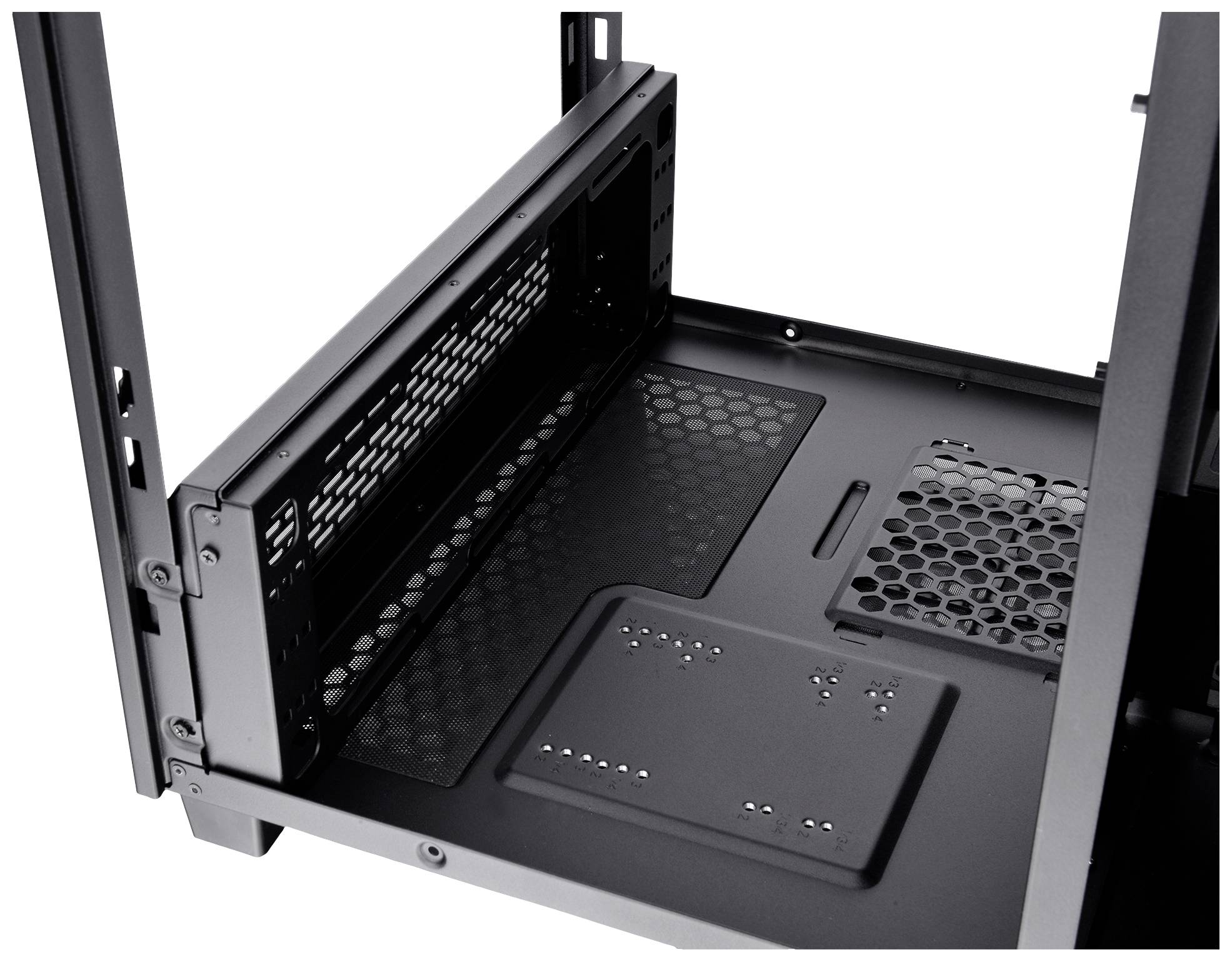 Black computer case shows the interior with ventilation slots and mounting points for hardware components.