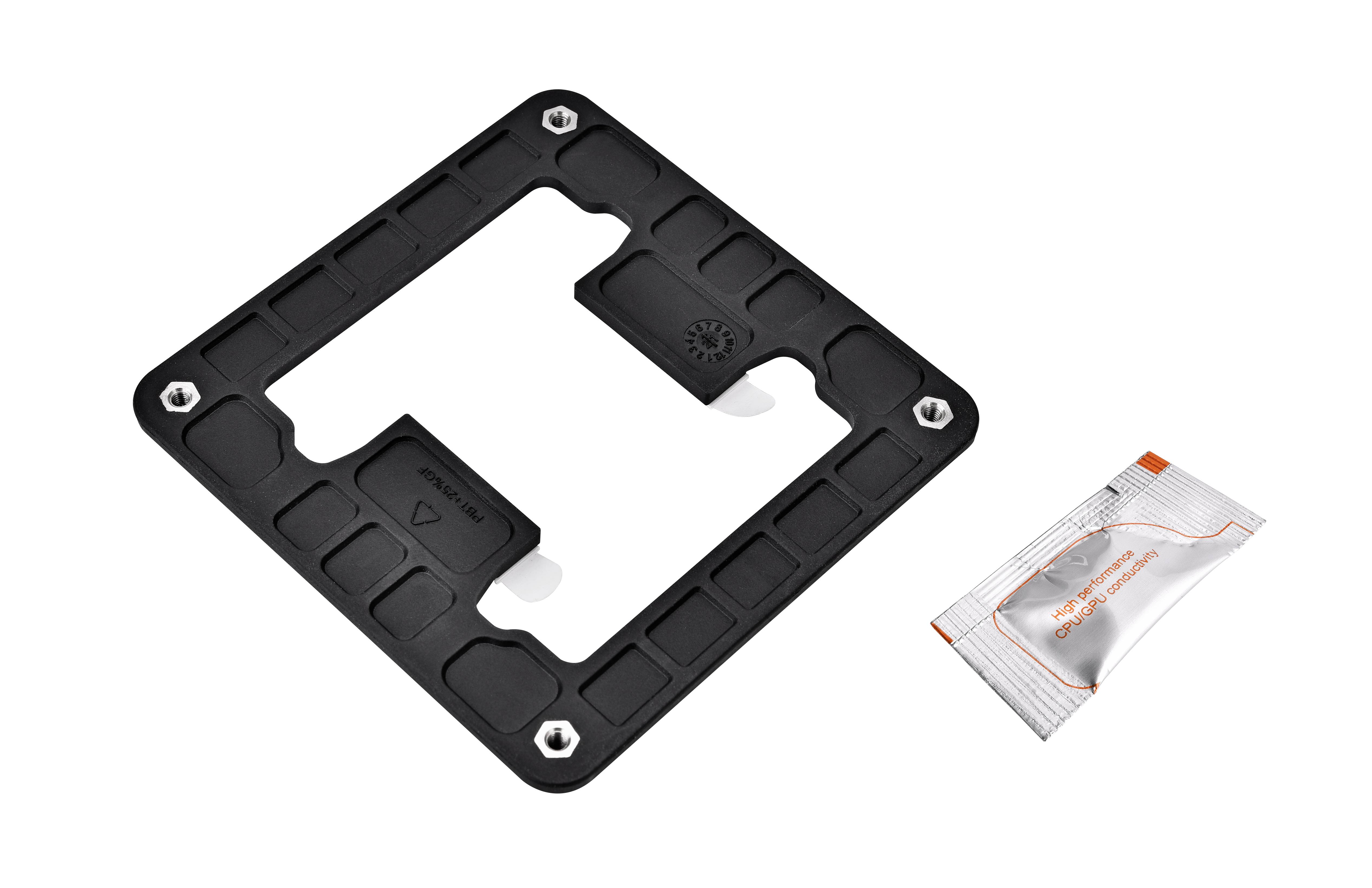 A black square mounting bracket with screw holes is lying next to a small pouch.