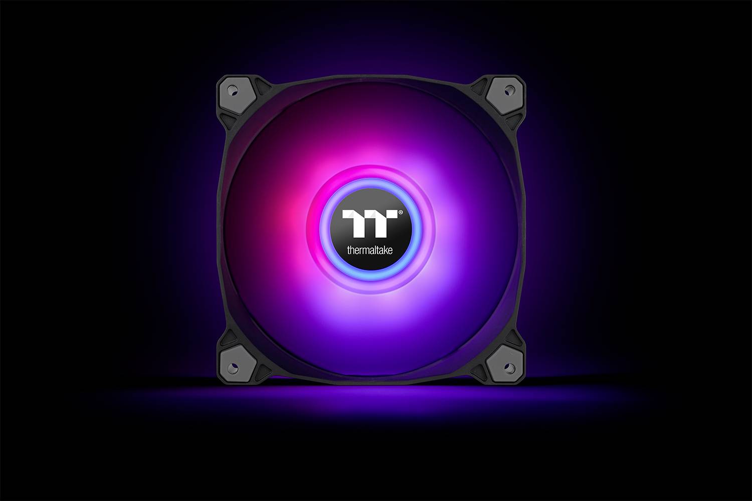A computer fan with illuminating LED lights in various colours. The 'Thermaltake' logo is positioned in the centre.