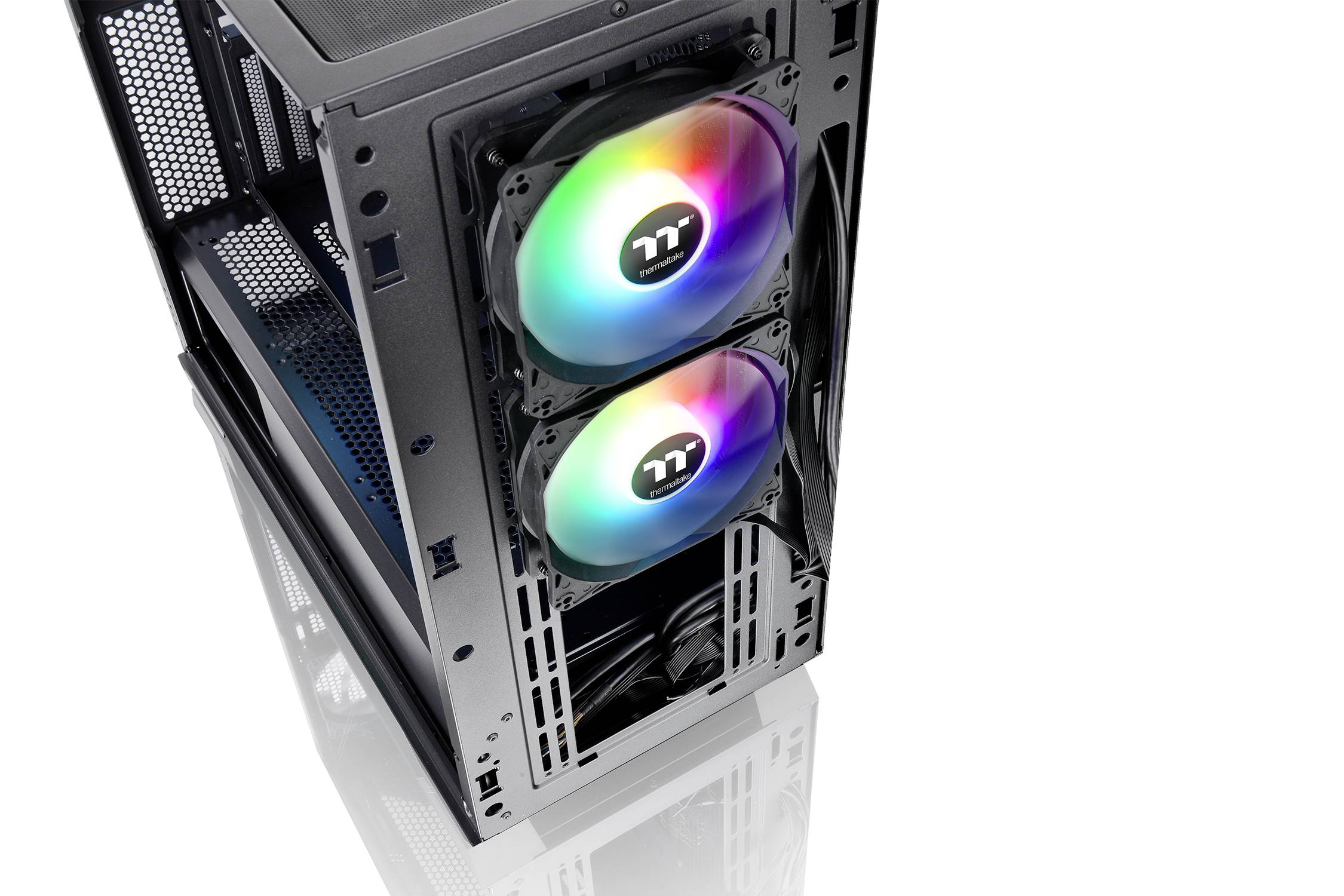 A computer case with two RGB-illuminated fans at the front, installed in an open, partially visible frame.
