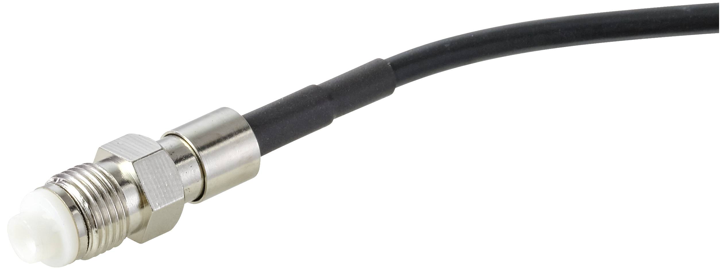 Close-up of a coaxial connector with a black cable. The plug is cylindrical, silver-coloured, and has a thread at its tip.