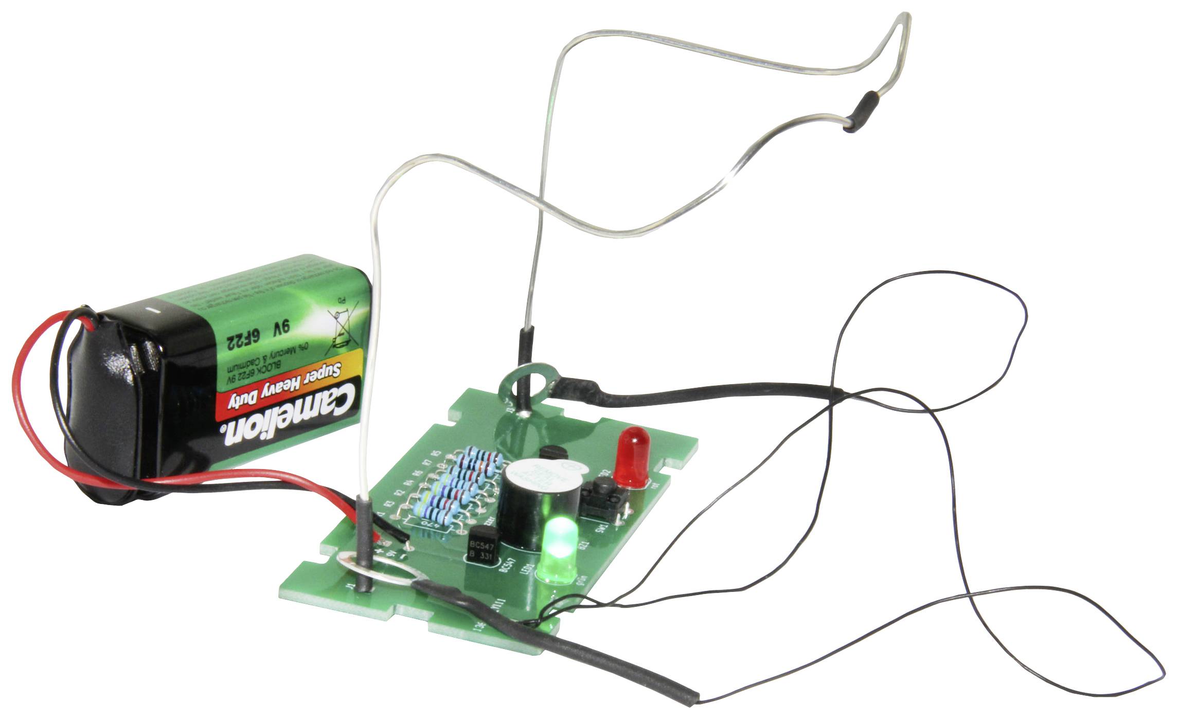 A circuit on a circuit board with a battery, light-emitting diodes and exposed wires, likely for an electronics project.