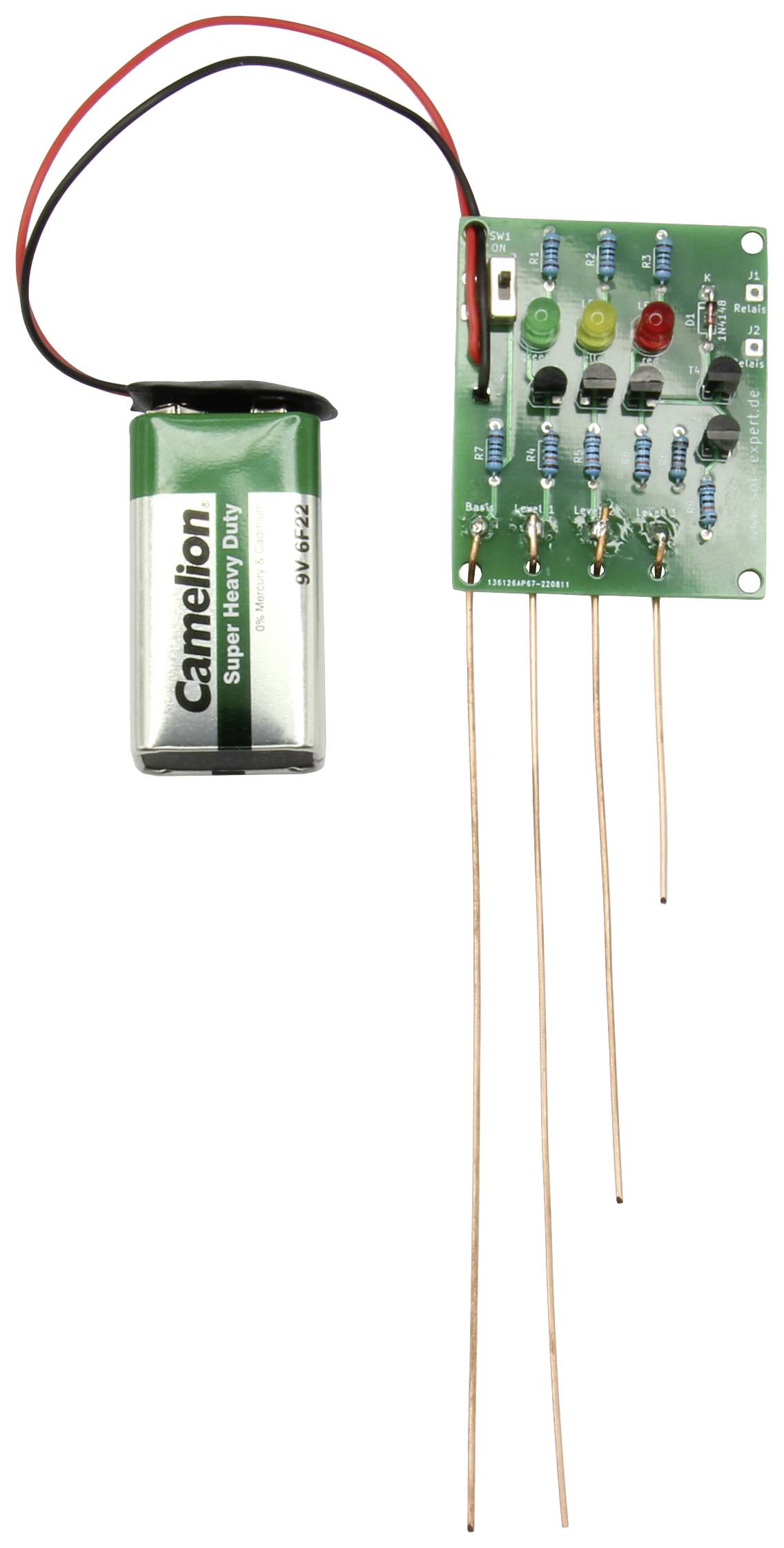 A circuit with a 9V battery connection, a green printed circuit board, featuring several resistors, LEDs, and sensor pins.