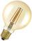 A light bulb with visible filaments and a golden fitting, illuminating.