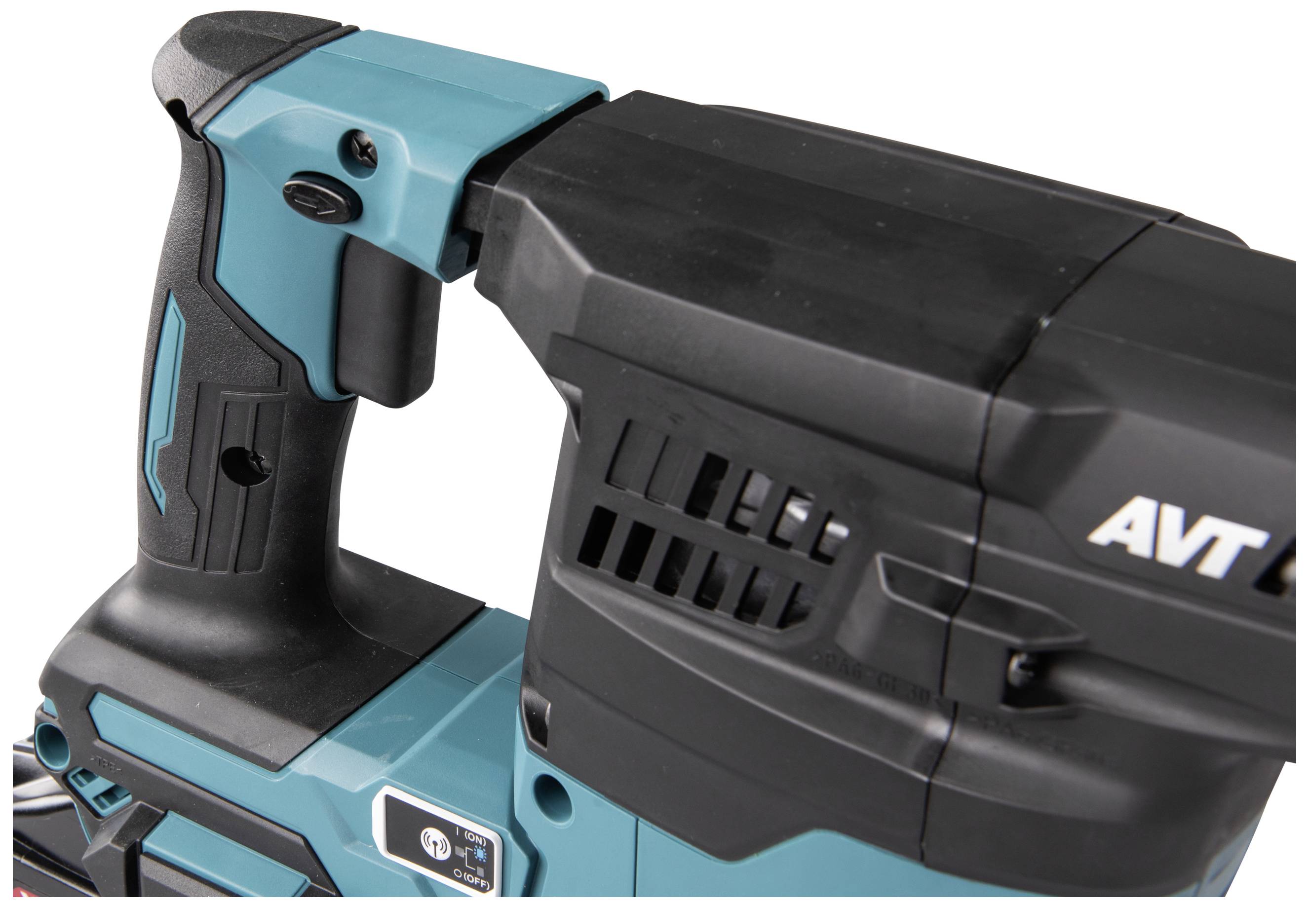 Cordless drill in close-up with ergonomic handle and ventilation slots, marked with 'AVT' on the side.