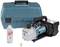 'Makita vacuum pump with handle in front of a blue transport case. Beside it sits a bottle of oil and a small metal attachment.'