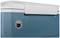 A blue portable cool box with a white lid and drainage tap on the side.