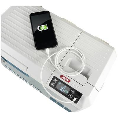 A smartphone is being charged on a white device. A charging symbol is displayed on the smartphone's screen.
