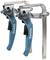 Two blue and silver quick-release clamps, standing side by side, with black handles and levers. 'Makita' brand name on the handles.